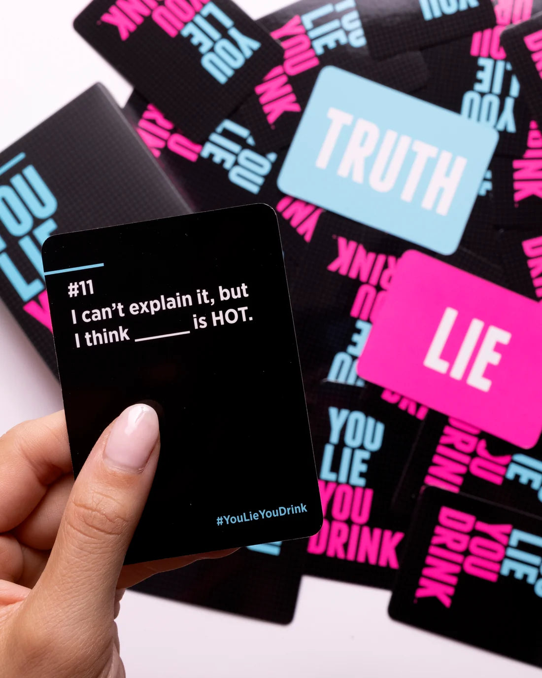 You Lie You Drink prompt card and playing cards