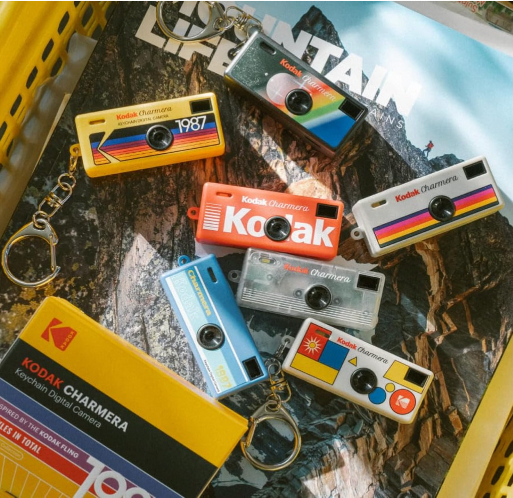 Kodak Charmera keychain cameras worn on bag