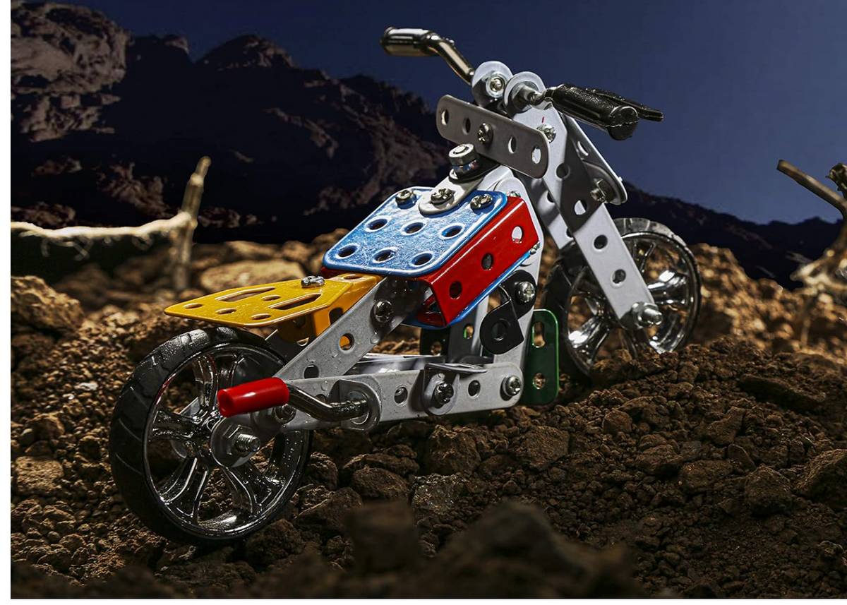 Zephyr Mechanix Motor Bikes assembled dirt bike model on rocky terrain