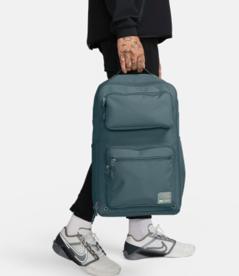 Nike Utility 2.0 Backpack slate teal lifestyle shot worn by model