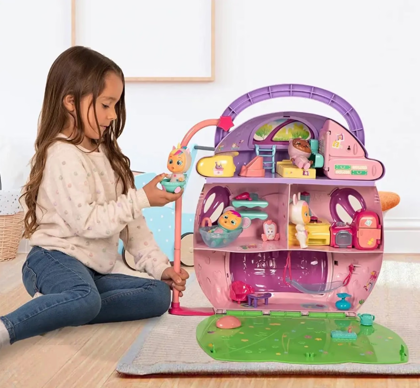 Child playing with the Cry Babies Dreamy’s Mega House