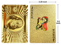 Gold-coloured playing cards fanned out beside their matching dollar-design box