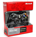Black controller in red packaging labelled Xbox 360 Controller for Windows