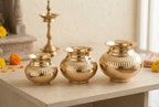 AI-styled three-size fluted lota range in a pooja corner; sold individually, props excluded.