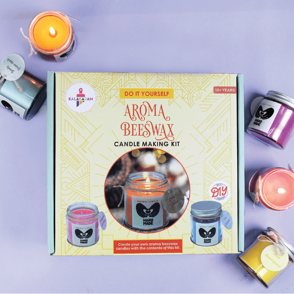 Kalakaram Aroma Beeswax Candle Making Kit box surrounded by colourful jar candles
