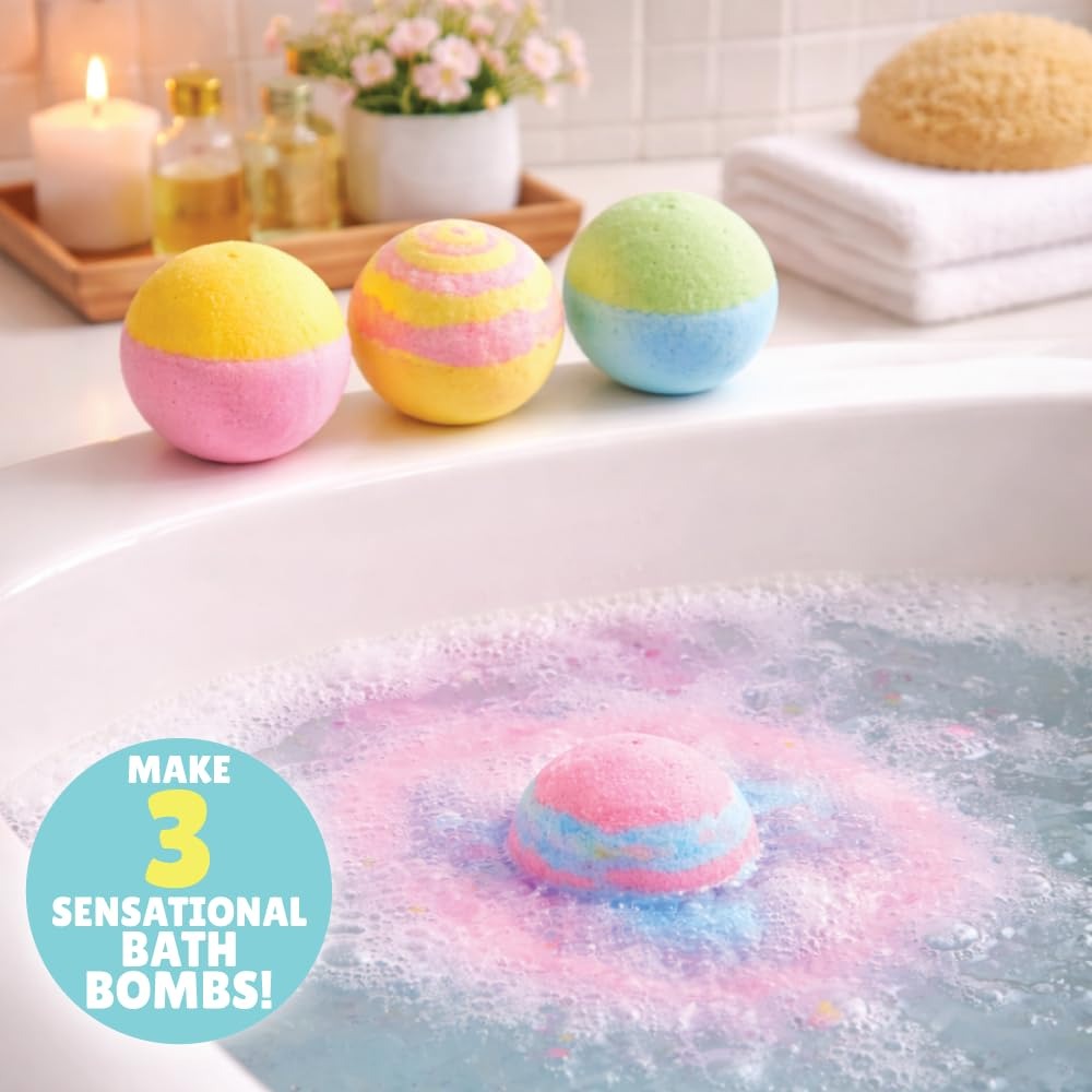 Three colourful bath bombs and a fizzing bath bomb made with the Kalakaram kit