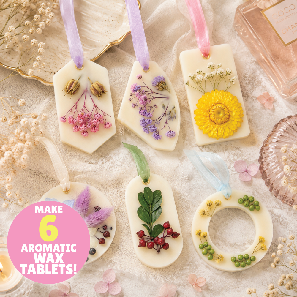 Six botanical wax tablets decorated with dried flowers and hanging ribbons