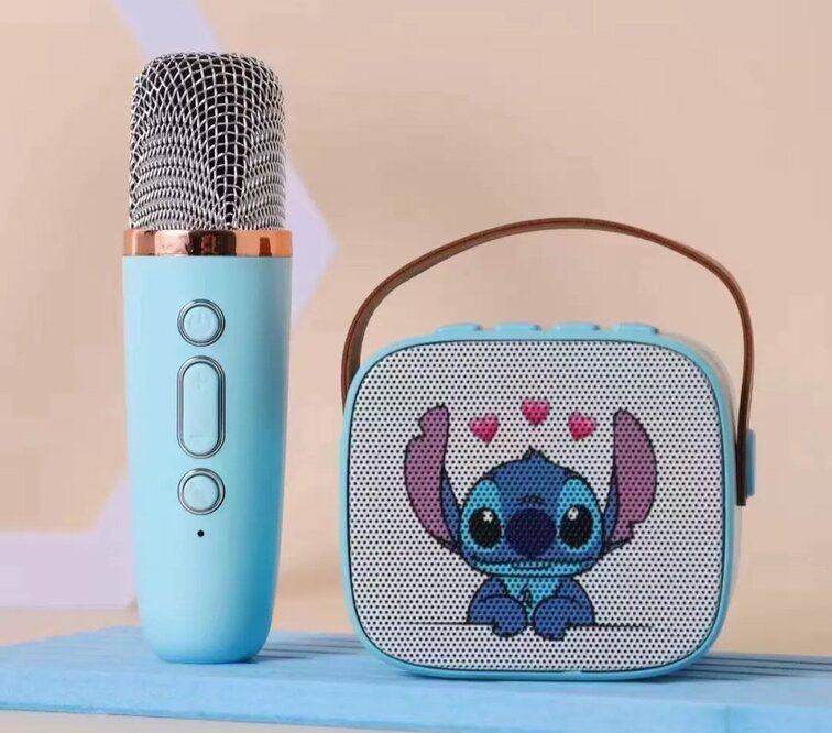 Turquoise Stitch karaoke speaker with hearts print, brown carry handle and silver microphone
