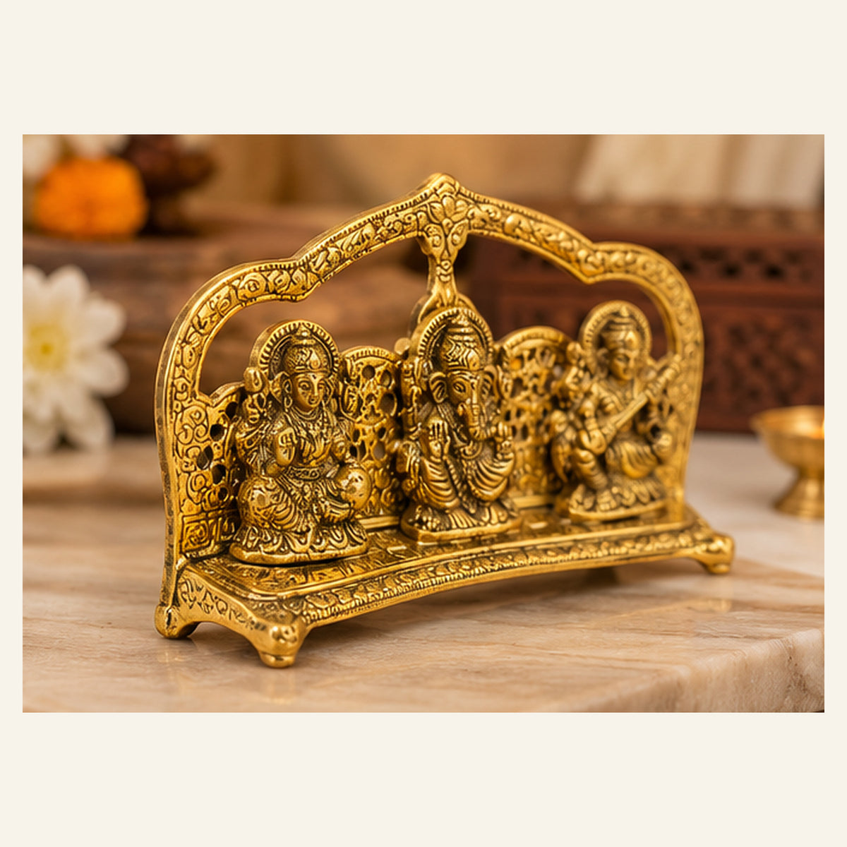 Lakshmi Ganesh Saraswati golden tabletop idol stand