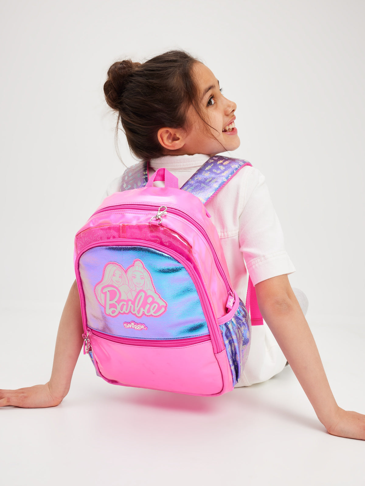 Smiggle Barbie medium school backpack - worn view showing size