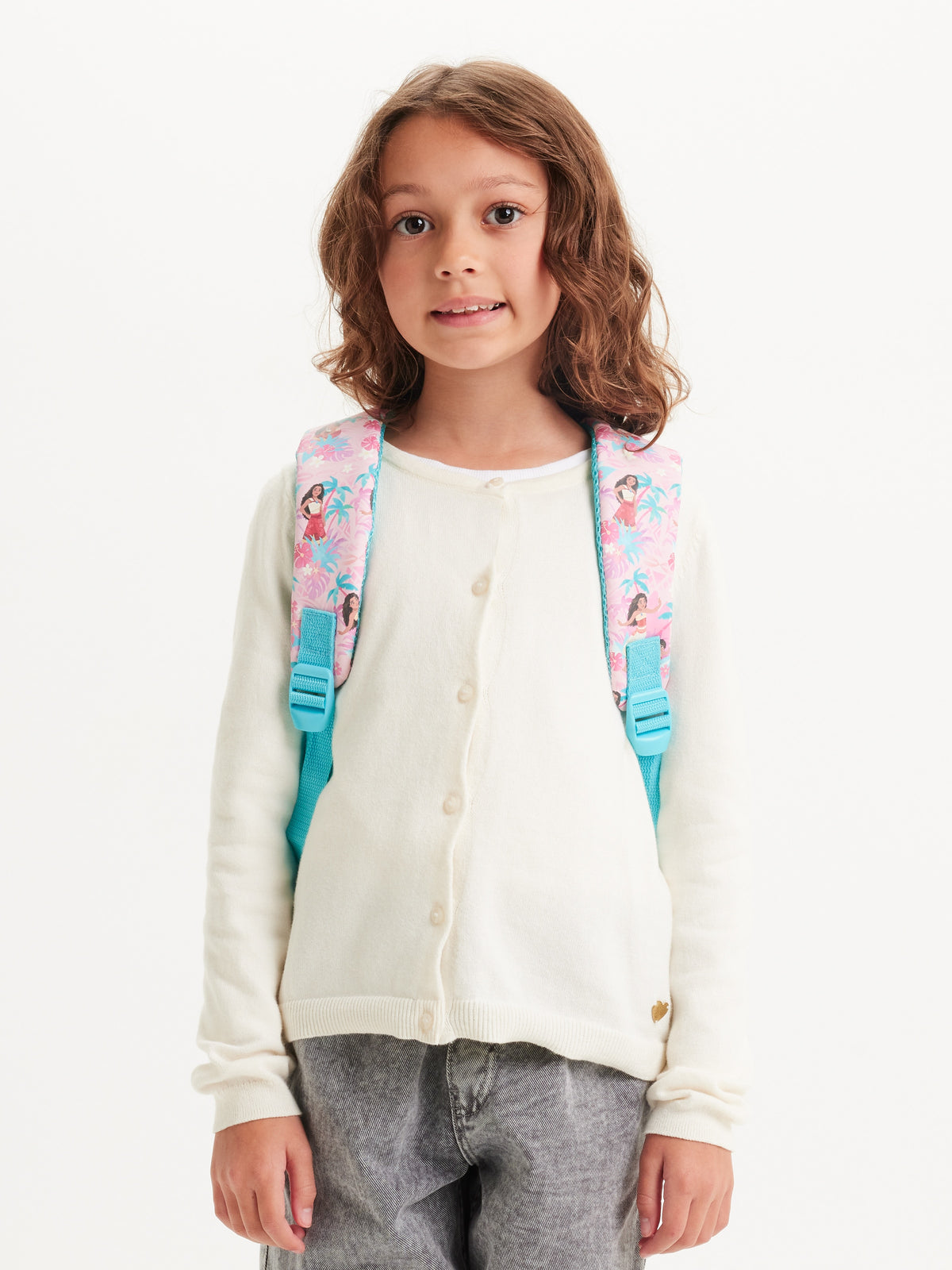 Smiggle Moana medium school backpack - worn view showing padded shoulder straps