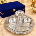 AI-styled product photo 1: Embossed Silver-Tone Pooja Thali Gift Set – 5 Pieces